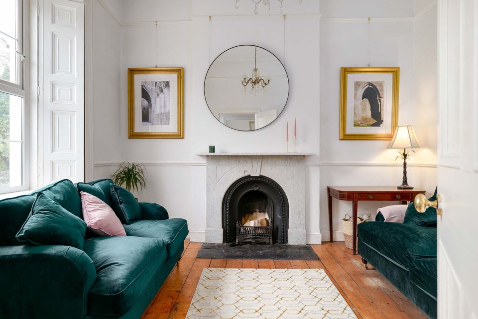 The light-filled sitting room retains an air of bygone grandeur