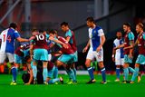 thumbnail: Ashley Westwood of Burnley takes a Blackburn fan down during the Carabao Cup Second Round match between Blackburn Rovers and Burnley at Ewood Park on August 23, 2017 in Blackburn, England. (Photo by Nathan Stirk/Getty Images)