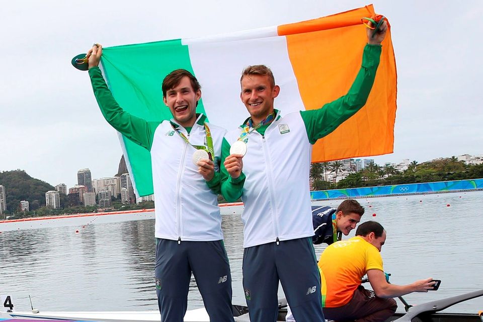 Silver medalists Gary O'Donovan (IRL) of Ireland and PaulO'Donovan (IRL) of Ireland pose with their medals and flag