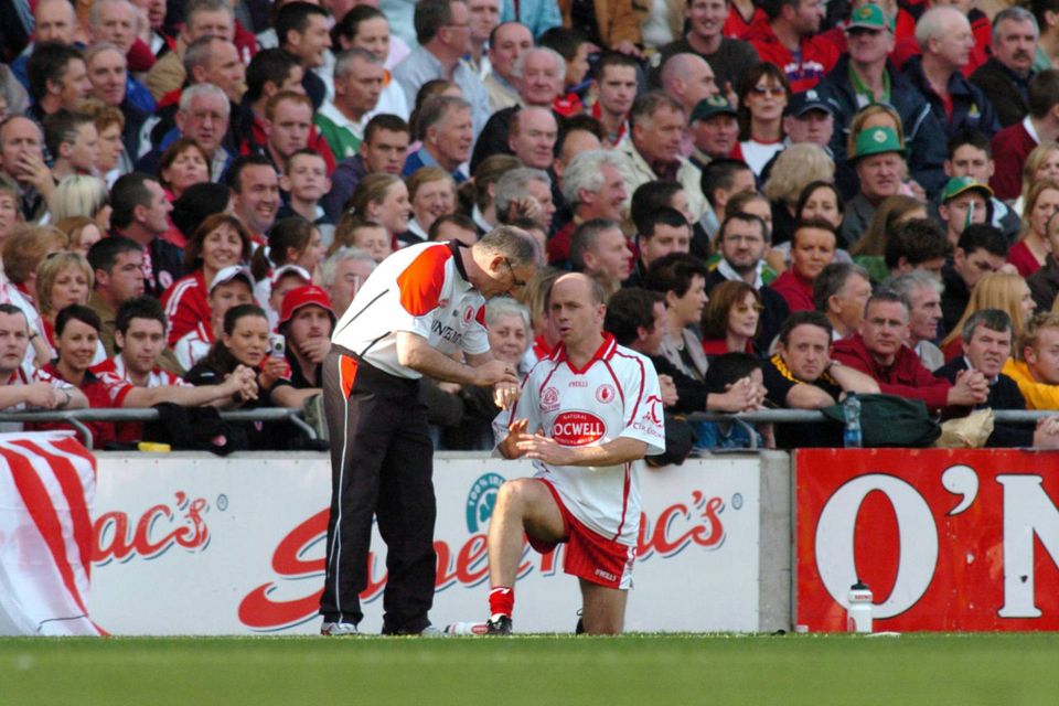 Mickey Harte counsels Peter Canavan during the 2005 All-Ireland final victory over Kerry.