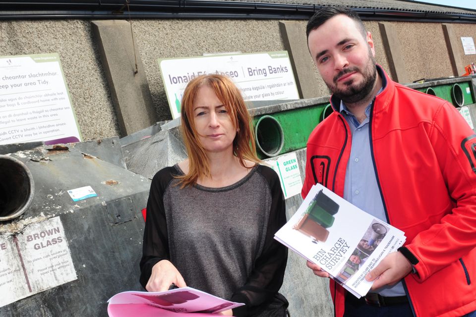 Deputy Clare Daly TD and activist, Dean Mulligan launching their report on bin services, in Swords.