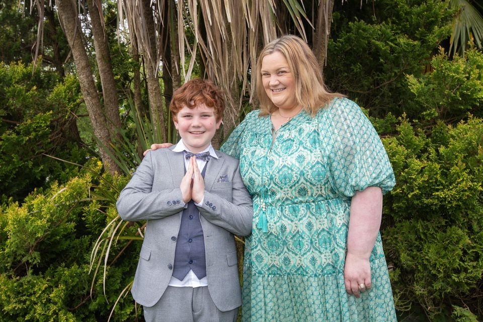 Amanda Dennison with her son, Lucas in his communion suit (PHOTO: Brian Farrell)