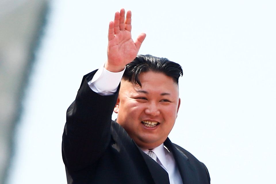 North Korean leader Kim Jong Un waves to people attending a military parade marking the 105th birth anniversary of country's founding father, Kim Il Sung in Pyongyang REUTERS/Damir Sagolj