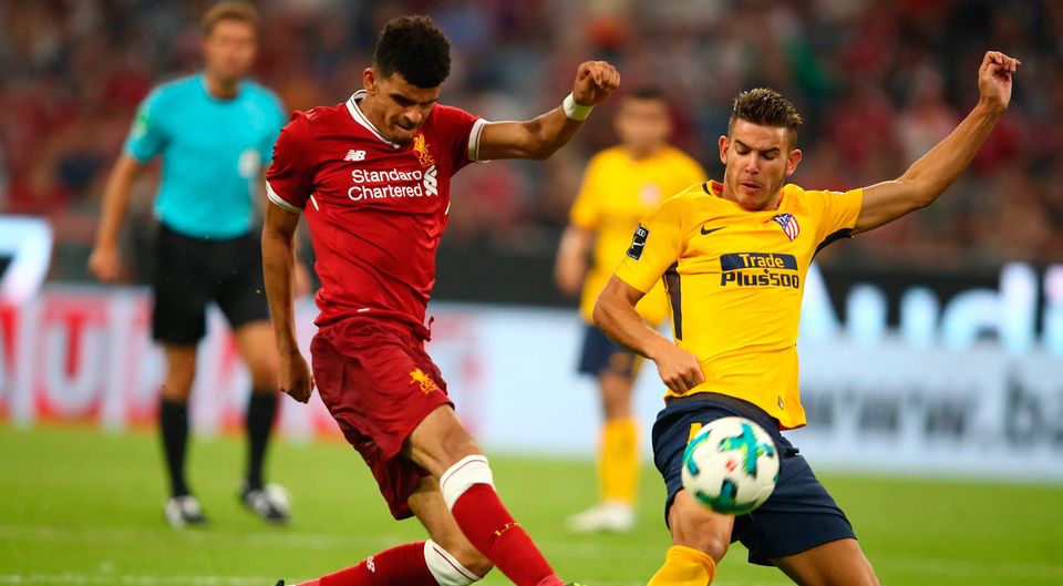 Liverpool's Dominic Solanke in action with Atletico Madrid's Lucas Hernandez. Photo: Reuters/Michael Dalder