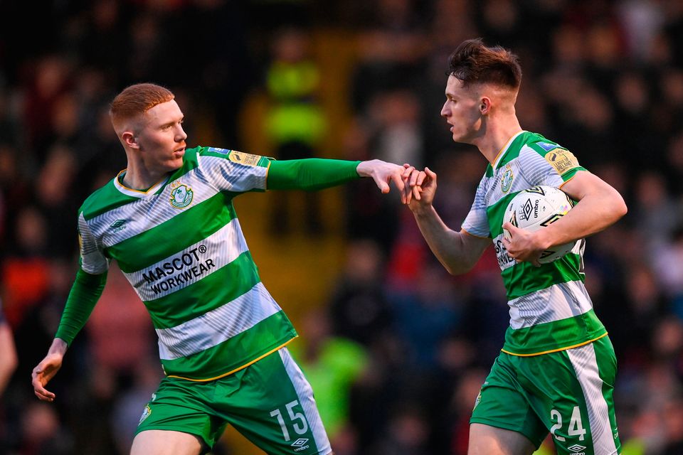 Johnny Kenny celebrates with his Shamrock Rovers team-mate Darragh Nugent, left, after scoring their side's first goal