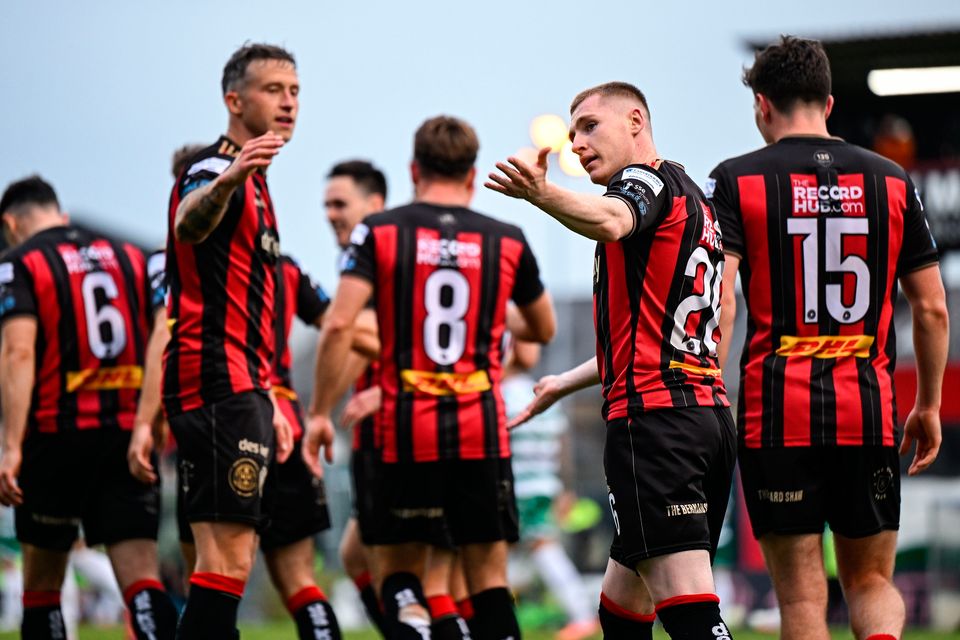 Ross Tierney of Bohemians, centre, celebrates his side's second goal scored by James Clarke, during the SSE Airtricity Premier Division win over Shamrock Rovers at Dalymount Park in Dublin. Photo: Shauna Clinton/Sportsfile