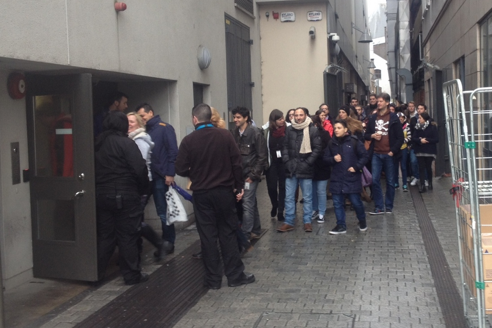 Employees returning to work at Apple's offices on Lavitt's Quay in Cork City around midday today.