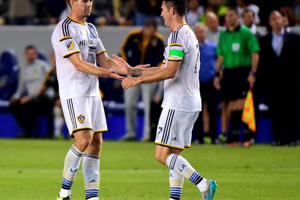 Robbie Keane of the LA Galaxy  (R) celebrates with Steven Gerrard (L)