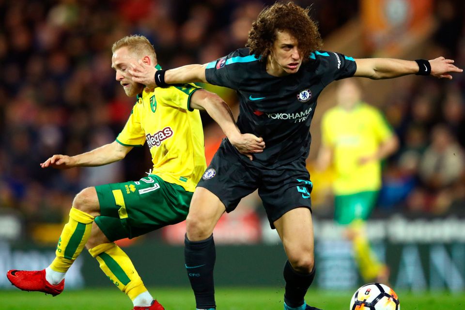 David Luiz of Chelsea is challenged by Alex Pritchard of Norwich City during The Emirates FA Cup Third Round match between Norwich City and Chelsea