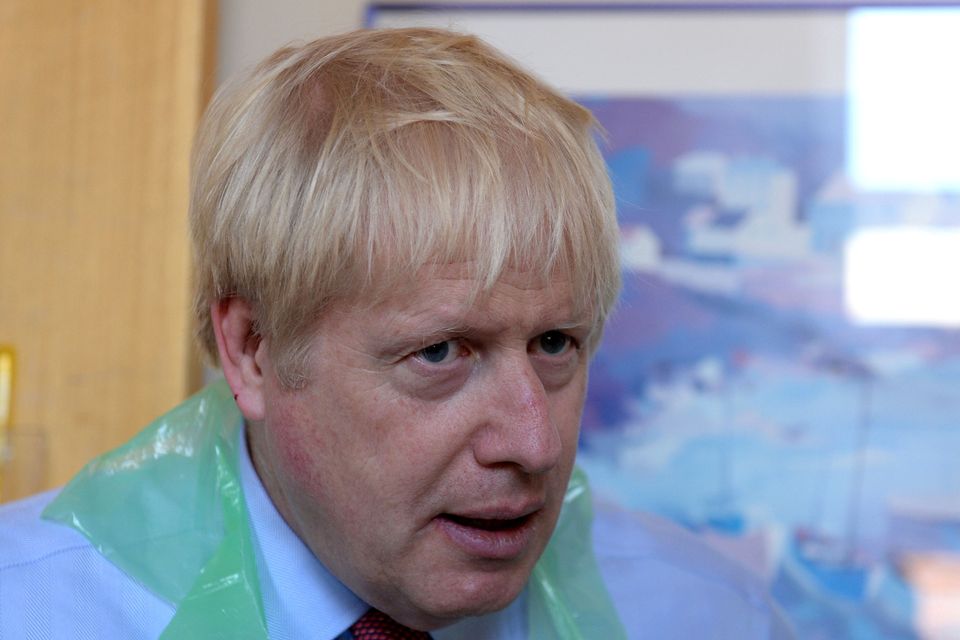 British Prime Minister Boris Johnson is seen during a visit to Torbay Hospital in Torquay today. Finnbarr Webster/Pool via REUTERS