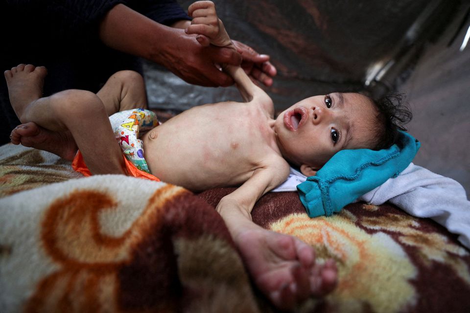 At least 31 Palestinians killed while heading to Gaza aid hub, hospital says