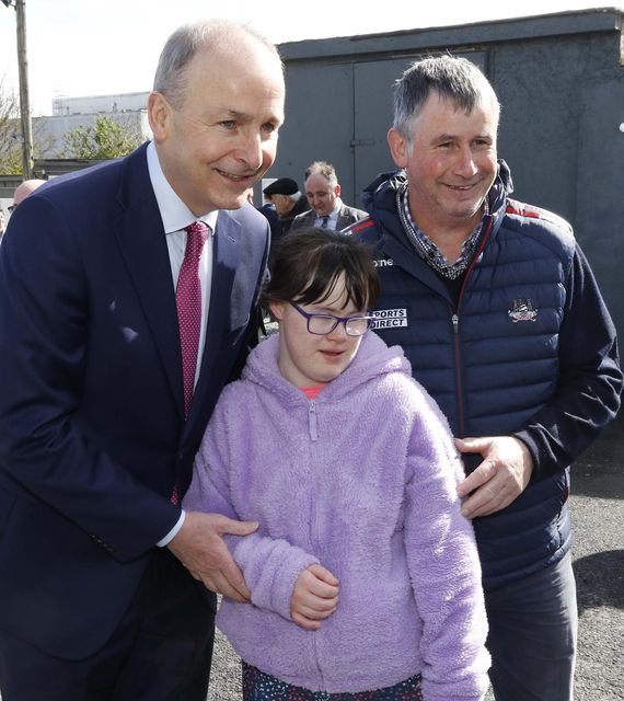 Tanaiste Micéal Martin with Ciara and Eamon McCarthy in Charleville at the opening of the Peter McVerry Trust social housing facility in the old CBS Building.last Friday.