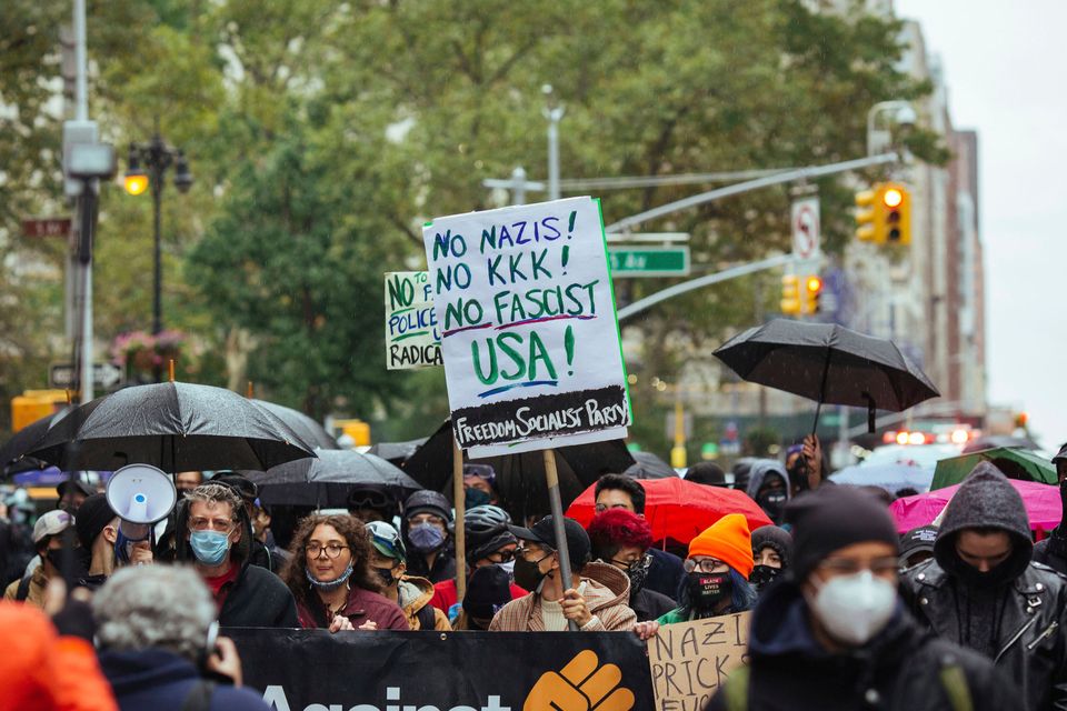 Activists march along 23rd Street in New York ahead of the US presidential election. Photo: AP Photo/Kevin Hagen