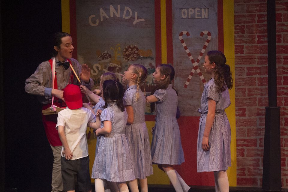 The Candy Man (Dawson Fleming) with children during a scene in the show.