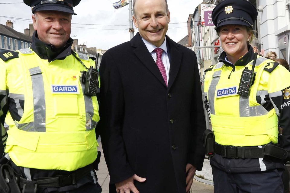 Tánaiste Micéal Martin T.D. pictured with Garda Ger Dillon and Sgt. Dierdre Toohey at the opening of the Peter McVerry Trust social housing facility at the old CBS building in Charleville.