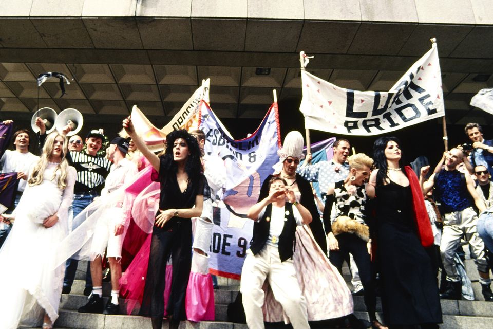 Celebration of the decriminalisation of homosexuality in Ireland on the steps of the Central Bank Plaza, Dame Street, Dublin in 1993. Photos by Christopher Robson/ courtesy of the National Library of Ireland