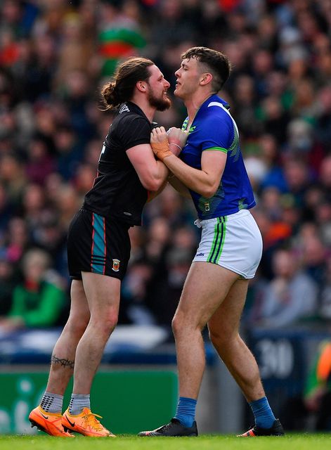Pádraig O'Hora of Mayo and David Clifford of Kerry jostle during last year's league final