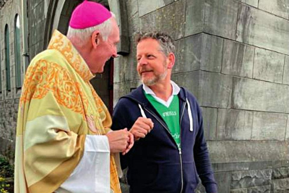 John Moran used a photo of himself with Bishop Brendan Leahy in advertising for his campaign.