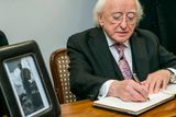 thumbnail: President Michael D Higgins and his wife Sabina signing the Book of Condolence for the late Fidel Castro at the Cuban Embassy on Pearse St Dublin. Photo: Kyran O'Brien