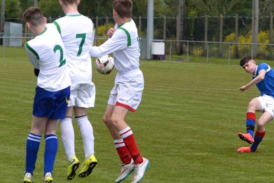 19/05/15. Dylan Reilly takes a free kick during the Under 15s soccer final between Colaiste Phadraig CBS and Templeouge College at Peamount Utd.
Pic: Justin Farrelly.