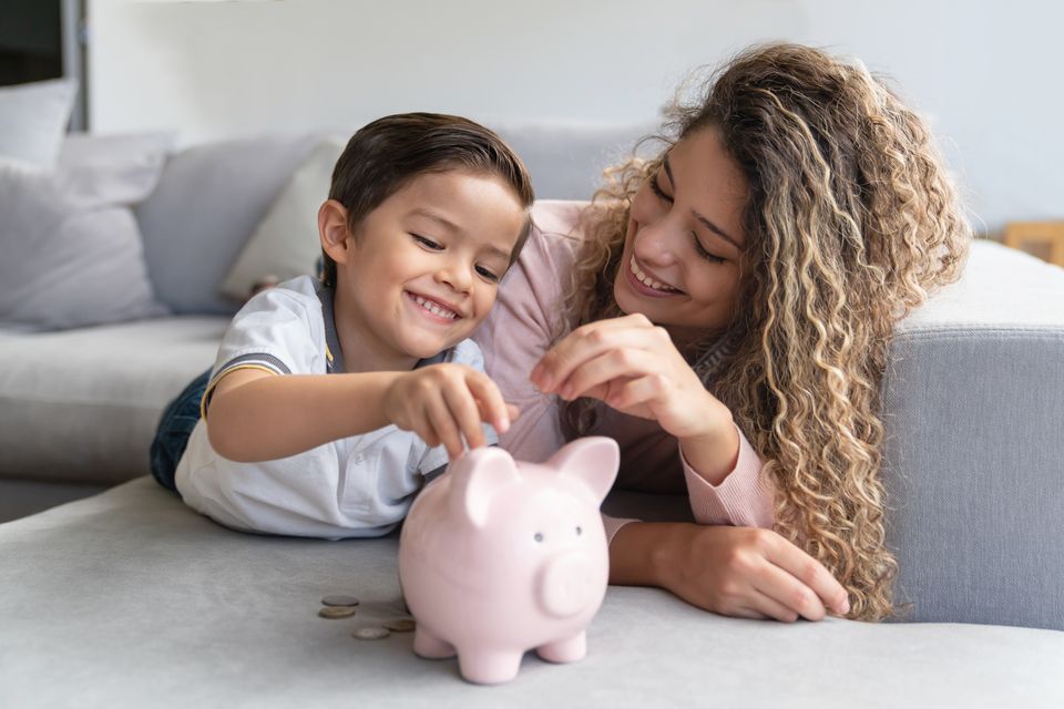 Teaching children about money is a fantastic life lesson. Stock image