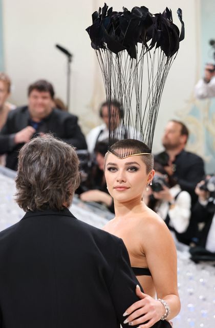 Florence Pugh poses at the Met Gala, an annual fundraising gala held for the benefit of the Metropolitan Museum of Art's Costume Institute with this year's theme "Karl Lagerfeld: A Line of Beauty", in New York City, New York, U.S., May 1, 2023. REUTERS/Andrew Kelly