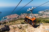 thumbnail: The cable car atop Mount Srd in Dubrovnik, Croatia treats all on board to stunning views. Photo: Dario Vuksanovic