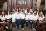 thumbnail: The Carysfort School Choir at the Canadh Le Cheile concert in St. Saviours Church, Arklow. Photo: Michael Kelly