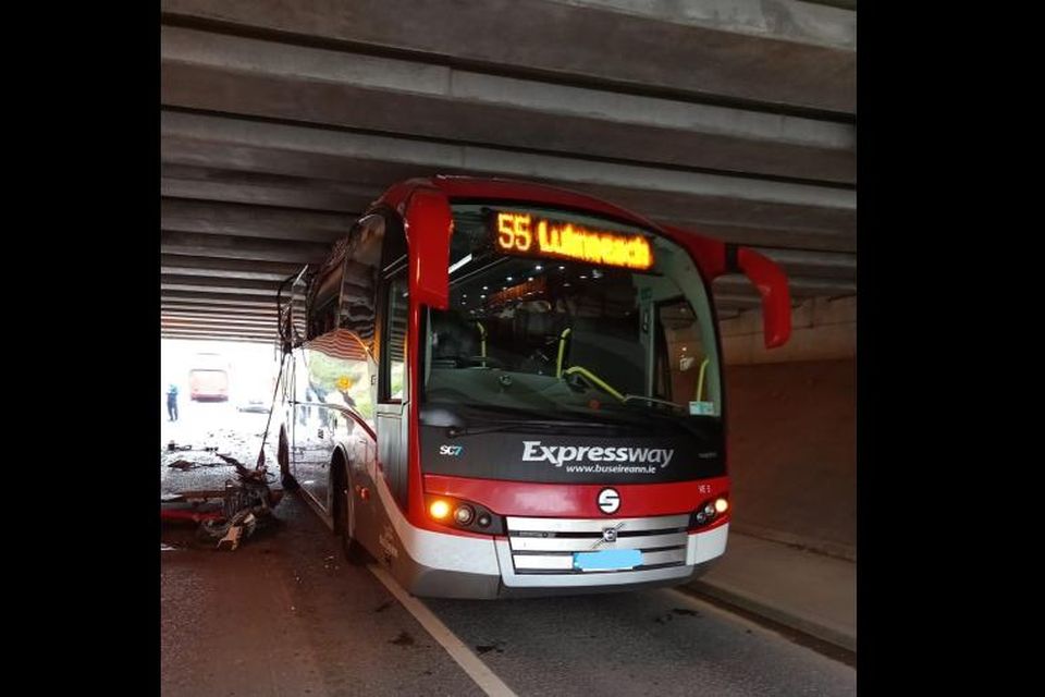 A Bus Éireann bus became stuck under a low bridge outside Waterford city