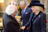 thumbnail: President Higgins shakes hands with the Duchess of Cornwall at the Irish Embassy in London