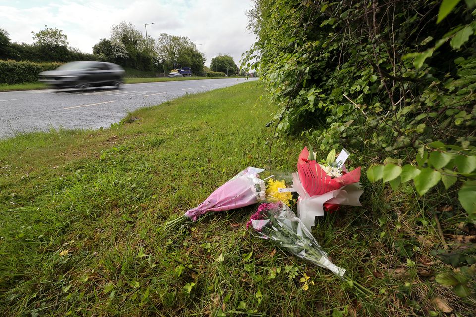 Flowers near the scene where Garda Kevin Flatley was killed as he tried to flag down a motorcyclist while operating a traffic checkpoint at Lanestown near Swords. Picture credit: Frank McGrath
