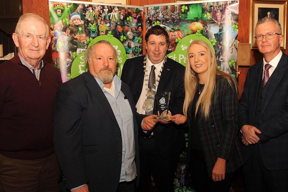 Trevor O'Donoghue and Charlene Hickey, Liebherr Container Cranes Most Original Entry Award, with Cathal Walshe, Grand Marshal, Cllr Niall Kelleher, Mayor of Killarney, and PJ McGee, Daly's SuperValu, sponsor, at the St. Patrick's Festival Killarney parade prizegiving function in The International Hotel on Tuesday night. Picture: Eamonn Keogh