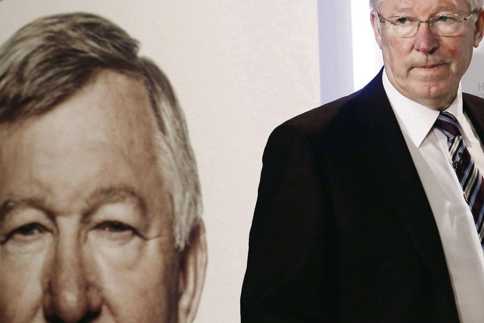 Former Manchester United manager Alex Ferguson arrives for a news conference for his new autobiography at the Institute of Directors in London