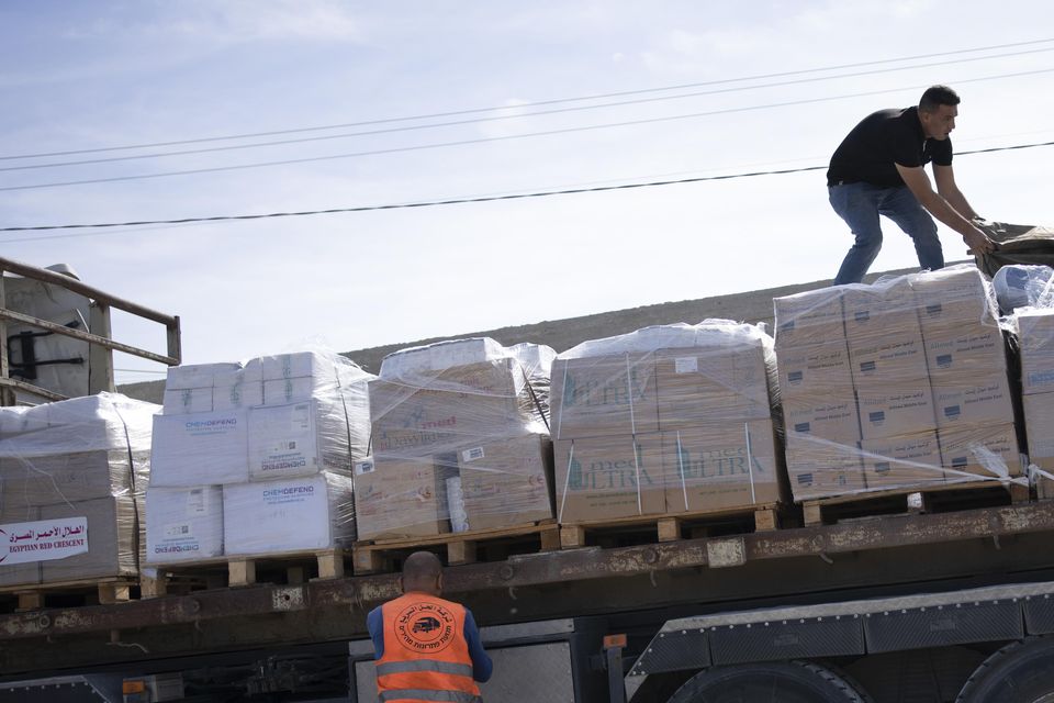 Trucks with humanitarian aid for the Gaza Strip enter from Egypt (Fatima Shbair/AP)