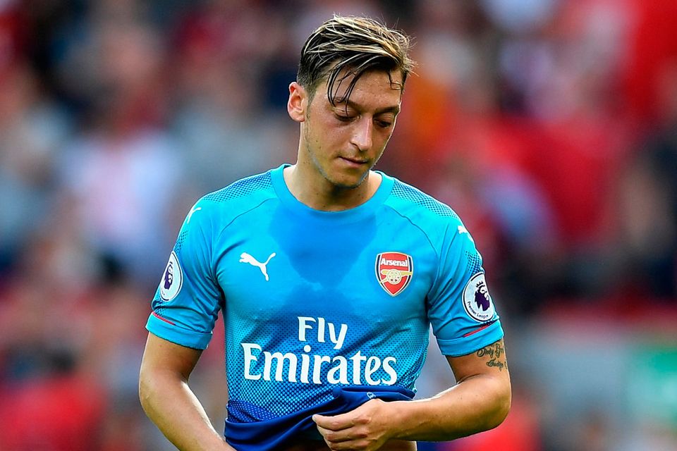Mesut Ozil of Arsenal is dejected after the Premier League match between Liverpool and Arsenal at Anfield on August 27, 2017 in Liverpool, England.  (Photo by Michael Regan/Getty Images)
