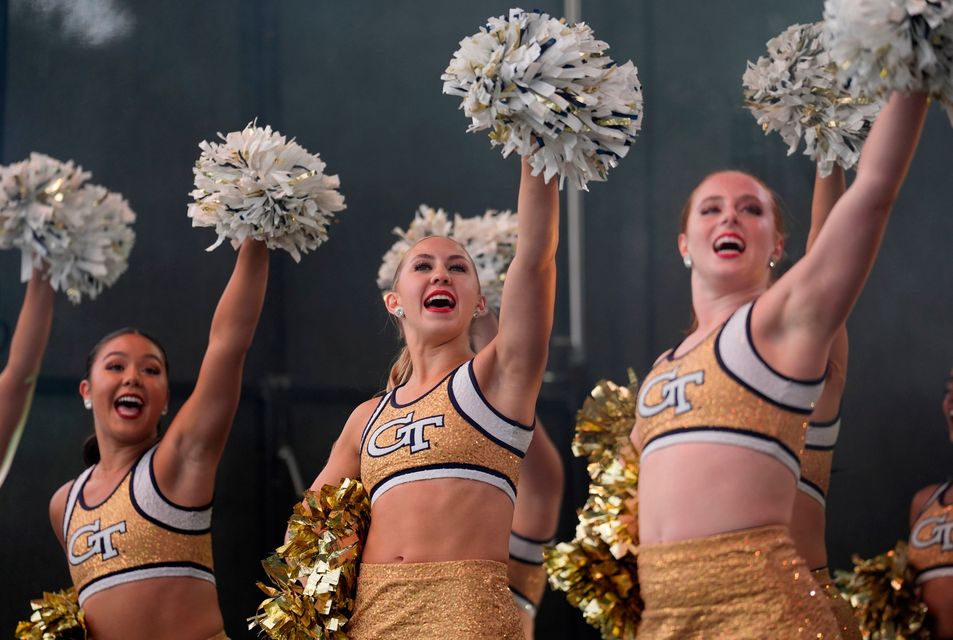 Georgia Tech cheerleaders performing at the Georgia Tech Helluva Block Party Pep Rally in Merrion Square, Dublin, as part of the build up to Saturday’s Aer Lingus College Football Classic, US College football match in Dublin. Photo: Brian Lawless/PA Wire