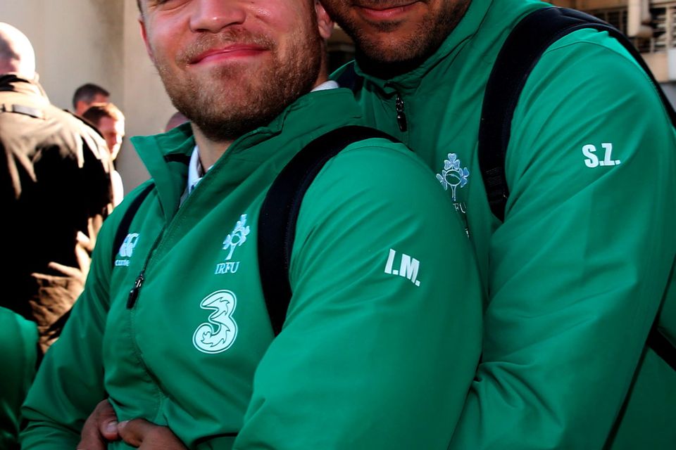 Ian Madigan (left) and Simon Zebo at Dublin Airport. Photo: Brian Lawless/PA Wire