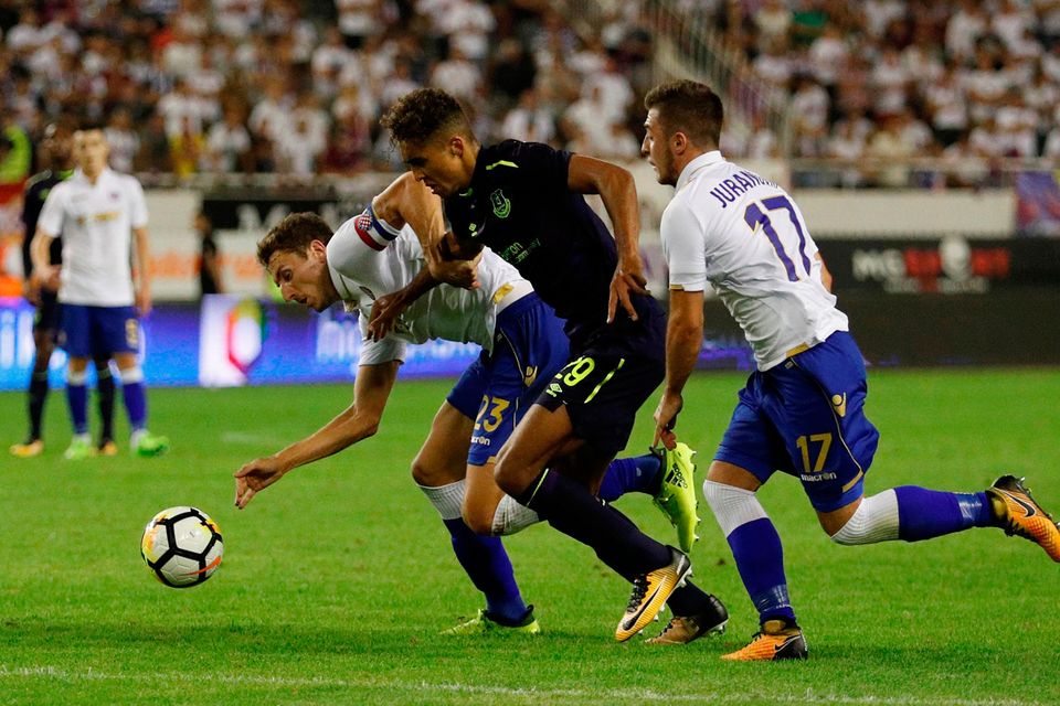 Everton's Dominic Calvert-Lewin in action with Hajduk Split's Zoran Nizic and Josip Juranovic. Photo: Reuters/Andrew Boyers