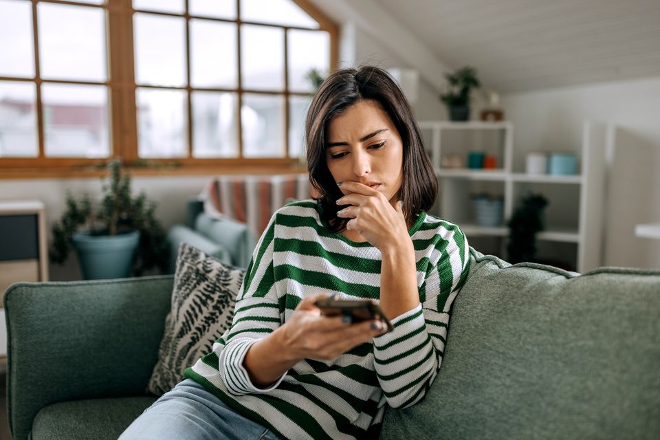 You are seeking reassurance by checking his phone, instead of addressing the feelings causing them. Photo: Getty
