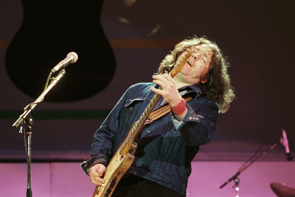 Rory Gallagher on stage at Self Aid in 1986