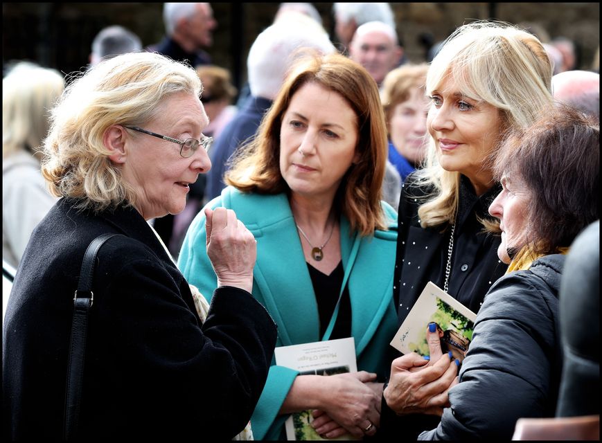 The Late Michael O'Regans sister Eilish O'Regan chats with Broadcasters Katie Hannon and Miriam O'Callaghan at The Holy Cross Church in Dundrum following Michael O'Regan's funeral mass. Photo by Steve Humphreys 24th February 2024.