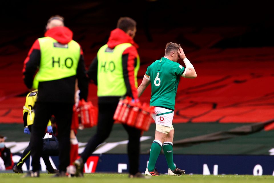 Peter O'Mahony of Ireland leaves the pitch after being shown a red card in Cardiff. (Photo: Chris Fairweather/Sportsfile)