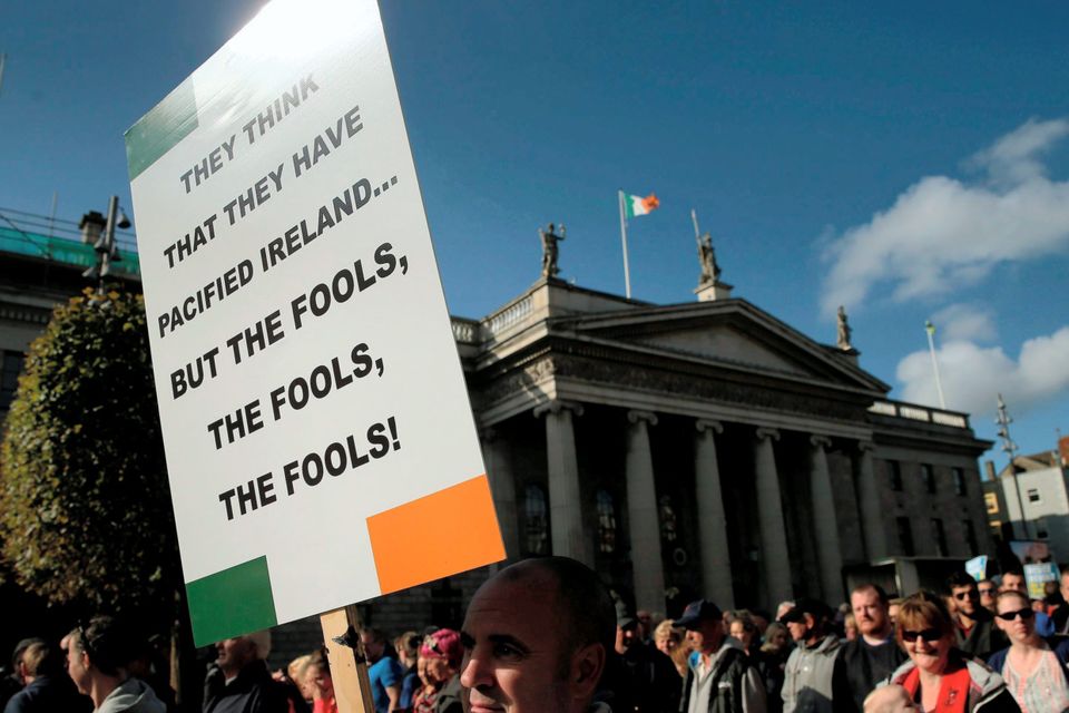 Protesters march on the streets of Dublin during a demonstration against water charges. Photo: PA