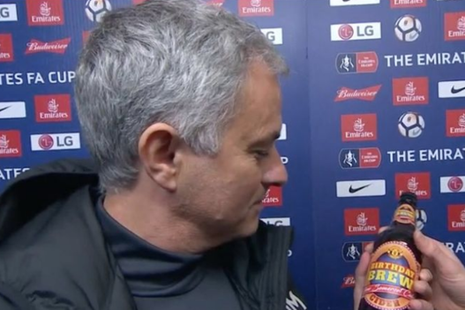 Jose Mourinho didn't seem keen to sample his bottle of cider