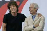 thumbnail: FILE PHOTO: The Rolling Stones members Mick Jagger (L) and Charlie Watts (R) answer a question during a press conference at the Julliard School of Music in New York May 10, 2005. REUTERS/Gary Hershorn/File Photo