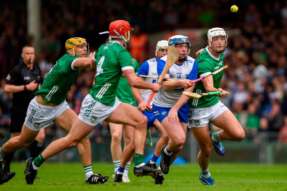 Stephen Bennett of Waterford is tackled by Kyle Hayes of Limerick