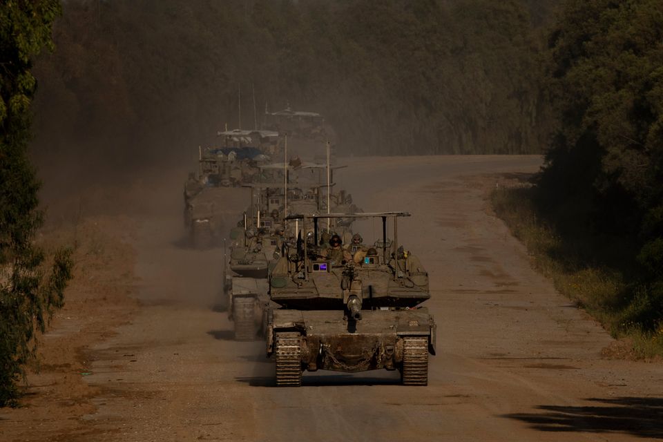 Israeli tanks along the border preparing to enter the Gaza Strip. Photo: Amir Levy/Getty Images