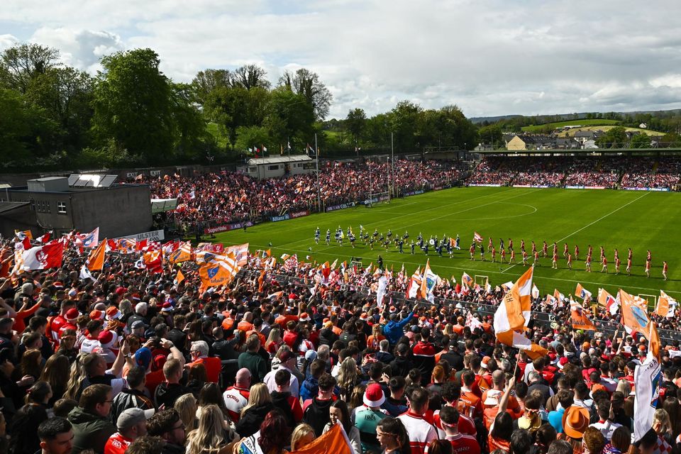 The Derry and Armagh teams parade before the Ulster SFC final at St Tiernach’s Park in Clones, Monaghan. Photo: Ramsey Cardy/Sportsfile