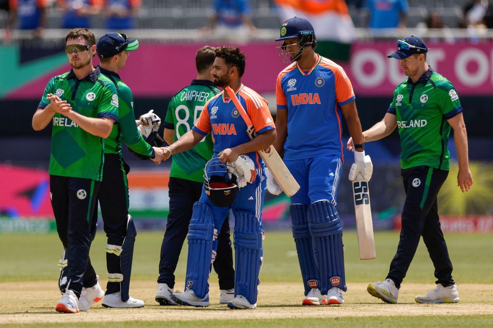 India batsmen Rishabh Pant, center left, and Shivam Dube are congratulated by Ireland players for their 8-wicket victory in an ICC Men's T20 World Cup cricket match at the Nassau County International Cricket Stadium in Westbury, New York