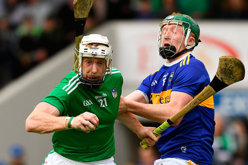 Jersey: Limerick's Cian Lynch takes on Brendan Maher of Tipperary, the Limerick kit was a big seller for Lifestyle Sports. Photo: Ray McManus/Sportsfile